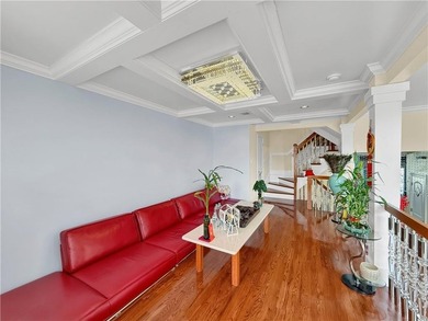 Built in 2013, this detached two-family home with brick front - photo 8