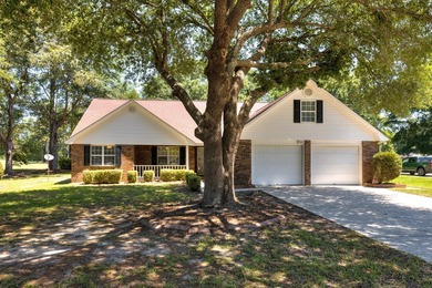 This charming home is on the 11th fairway of Lakewood Links. It - photo 1