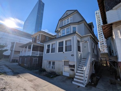 Fully occupied 4 unit bldg in the shadow of the Ocean Casino - photo 1