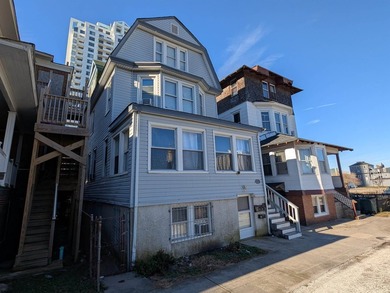 Fully occupied 4 unit bldg in the shadow of the Ocean Casino - photo 2