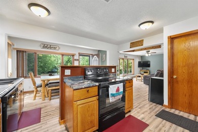 Experience the joy of lakeside living in this beautifully - photo 7