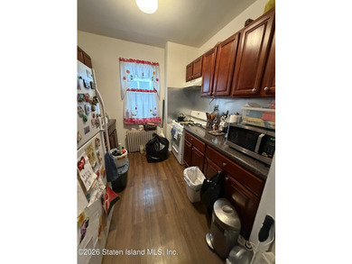 Perfect for investors, 187 Van Buren Street is a fully detached - photo 8