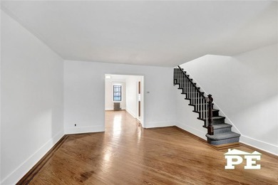 Welcome to 1392 Troy Avenue, a solid brick two-family home in - photo 5