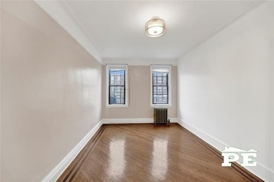 Welcome to 1392 Troy Avenue, a solid brick two-family home in - photo 8