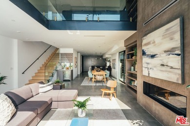 A refined coastal retreat awaits at this newly built modern - photo 3