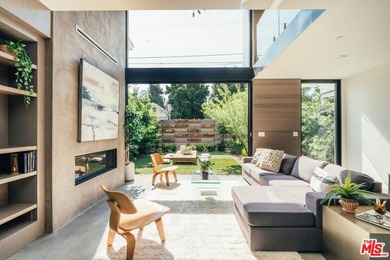 A refined coastal retreat awaits at this newly built modern - photo 4