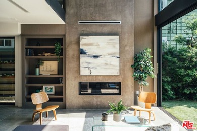 A refined coastal retreat awaits at this newly built modern - photo 5