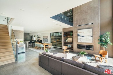 A refined coastal retreat awaits at this newly built modern - photo 6