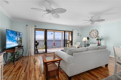 Indulge in waterfront living in this beautifully updated