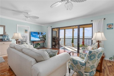 Indulge in waterfront living in this beautifully updated