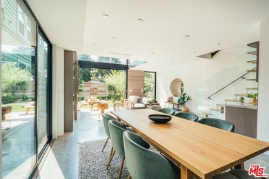 A refined coastal retreat awaits at this newly built modern - photo 10