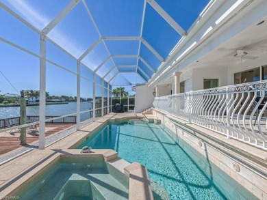 This home truly checks all the boxes! Set on a triple-wide canal - photo 1