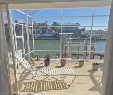 This home truly checks all the boxes! Set on a triple-wide canal - photo 6