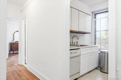 This sun-drenched one-bedroom is the kind of home that is - photo 20