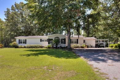Enjoy lakefront living at its finest with this beautifully - photo 1