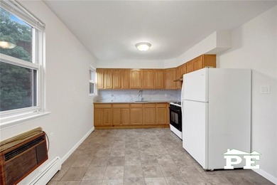 Welcome to 1410 West 6th Street, an oversized solid brick - photo 5