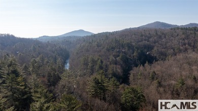 Tucked within a serene, beautifully wooded cul-de-sac, this - photo 2