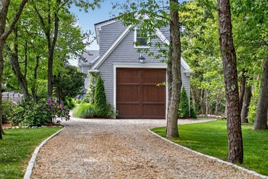 Where home and horizon merge, this waterfront estate on - photo 2