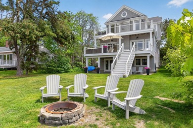 Where home and horizon merge, this waterfront estate on - photo 5