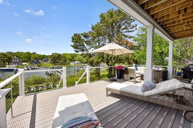 Where home and horizon merge, this waterfront estate on - photo 7