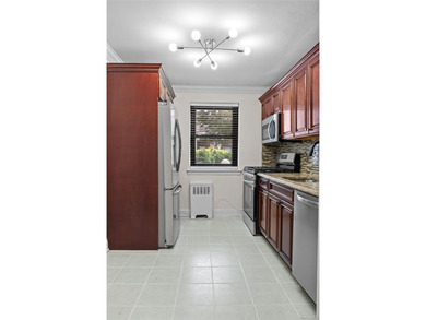 Step into this beautifully renovated 1-bedroom home and enjoy - photo 2