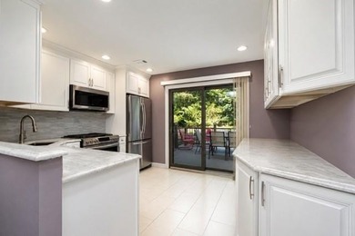 Welcome home to this beautifully maintained townhouse-style - photo 8