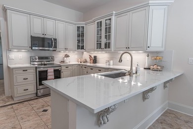 Located in the prestigious gated community of The Bluffs on the - photo 4