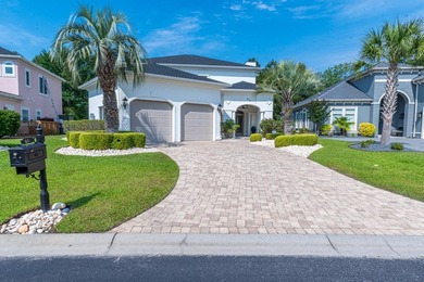 Located in the prestigious gated community of The Bluffs on the - photo 6