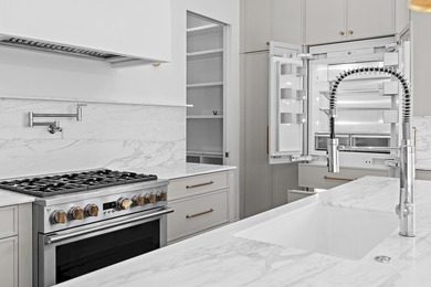Less than a mile from the beach, this breathtaking new - photo 5
