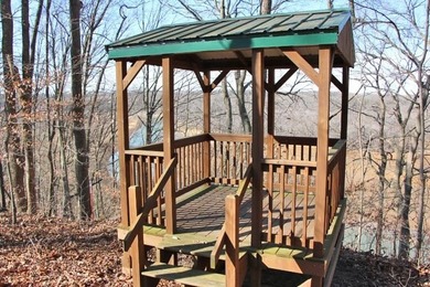 LAKE FRONT WITH PANORAMIC YEAR-ROUND LAKE VIEWS! YOU ARE LESS - photo 12