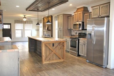 LAKE FRONT WITH PANORAMIC YEAR-ROUND LAKE VIEWS! YOU ARE LESS - photo 18