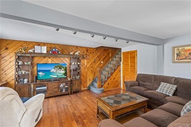 This spacious 3-story home in Gerritsen Beach sits on a double - photo 3