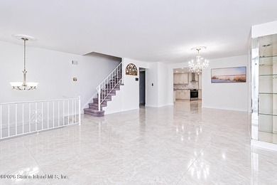 Welcome to 833 Rensselaer Avenue, a spacious semi-attached home - photo 3