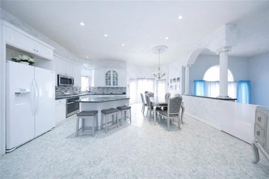 Welcome to an exceptional custom brick estate set on an - photo 5