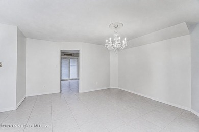 Welcome to 833 Rensselaer Avenue, a spacious semi-attached home - photo 5