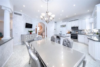 Welcome to an exceptional custom brick estate set on an - photo 6