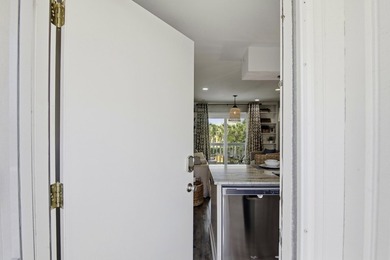 Located on coveted Holiday Isle, this fully furnished - photo 8