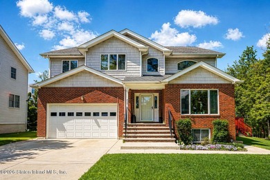 Welcome to this stunning 2-family colonial tucked away on a - photo 1