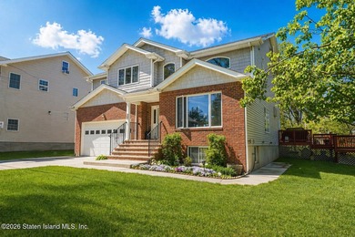 Welcome to this stunning 2-family colonial tucked away on a - photo 2