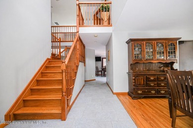 Welcome to this stunning 2-family colonial tucked away on a - photo 4