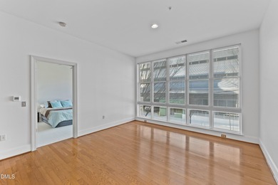 Move in ready condo at The Dawson, where modern elegance meets