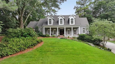 Tucked away in a great family neighborhood, this solid, handsome - photo 1