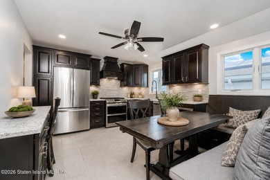 Welcome to 201 Arlene Street! This spacious 2-family, high-ranch - photo 3