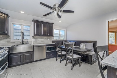 Welcome to 201 Arlene Street! This spacious 2-family, high-ranch - photo 6