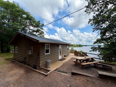 Escape to the Northwoods with this inviting two bedroom - photo 1