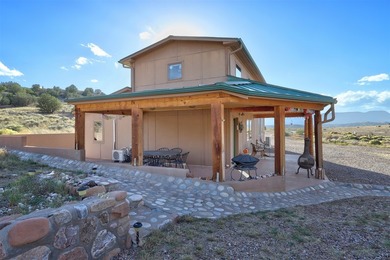 Come and enjoy the vistas of Abiquiu Lake and the red rocks of - photo 1