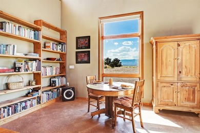 Come and enjoy the vistas of Abiquiu Lake and the red rocks of - photo 7