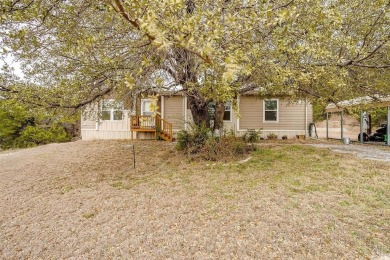 Welcome home to this Cute 2018 home near lake Granbury. This 3