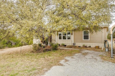 Welcome home to this Cute 2018 home near lake Granbury. This 3