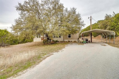 Welcome home to this Cute 2018 home near lake Granbury. This 3